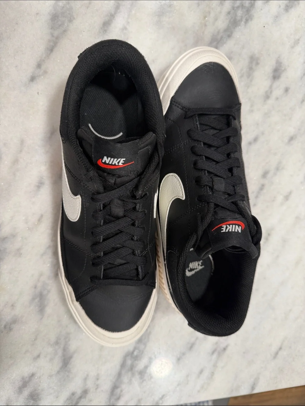 Nike Women's Black Casual Sneakers with White Swoosh